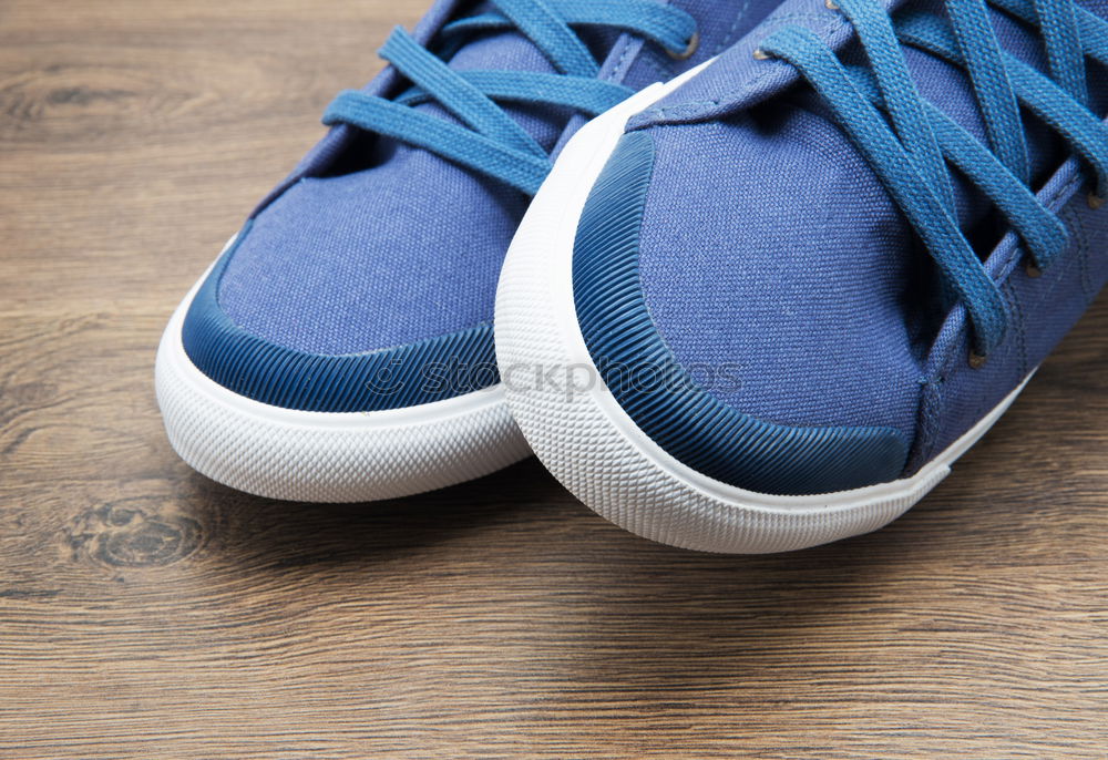 Similar – Image, Stock Photo male blue textile sneakers