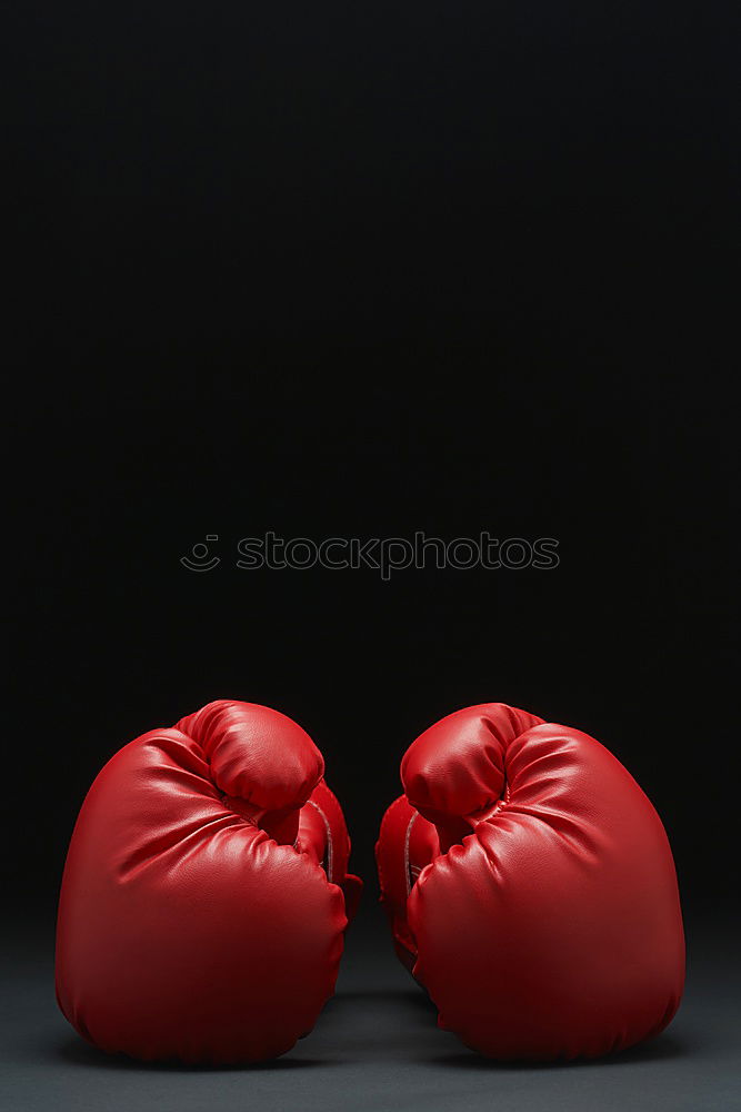 Similar – Image, Stock Photo red leather boxing gloves and a black textile bandage