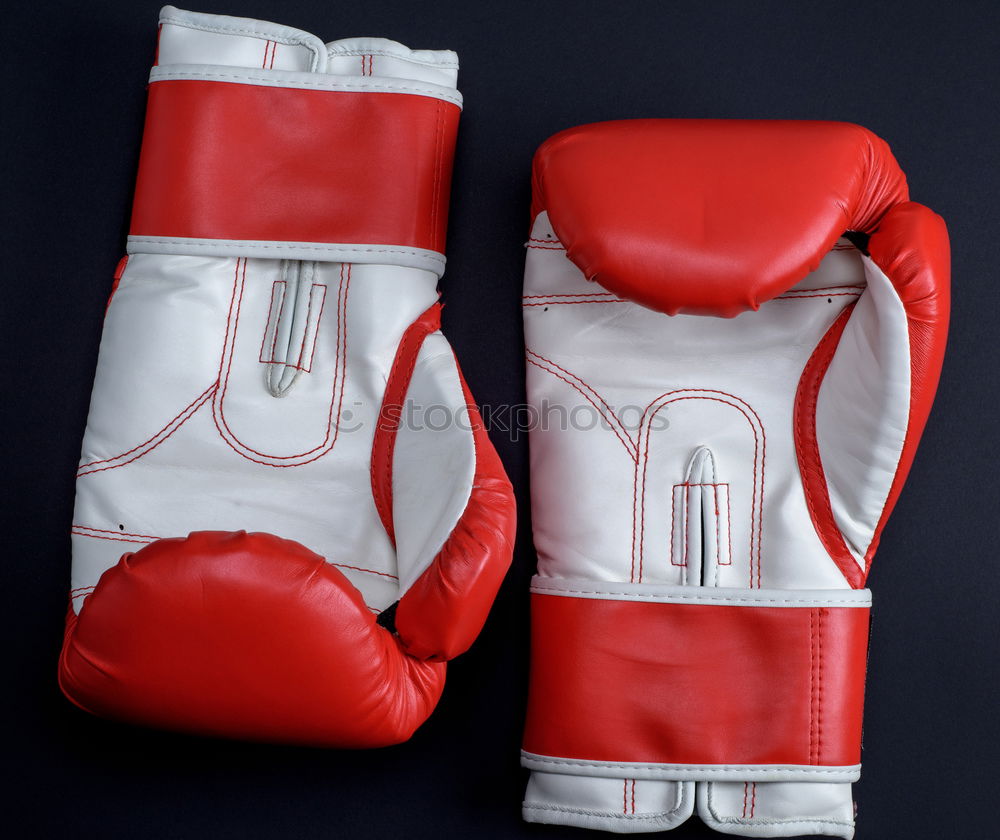 Similar – Image, Stock Photo red leather boxing gloves and a black textile bandage