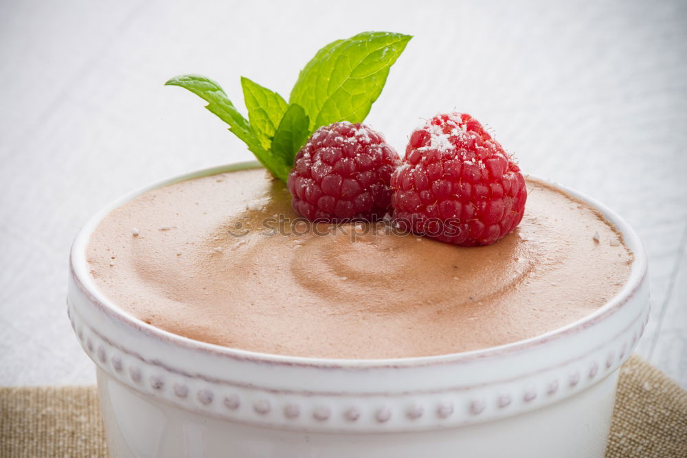 Similar – Chia yogurt with raspberries in a glass cup