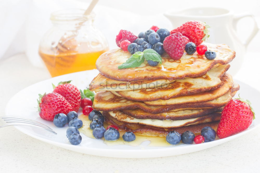 Similar – Image, Stock Photo Pancakes with raspberries and blueberries isolated