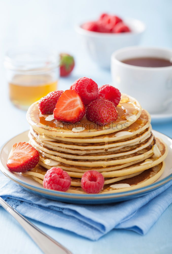 Similar – Pancakes with raspberries and blueberries