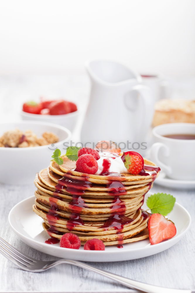 Similar – Image, Stock Photo Pancakes with raspberries and blueberries on white