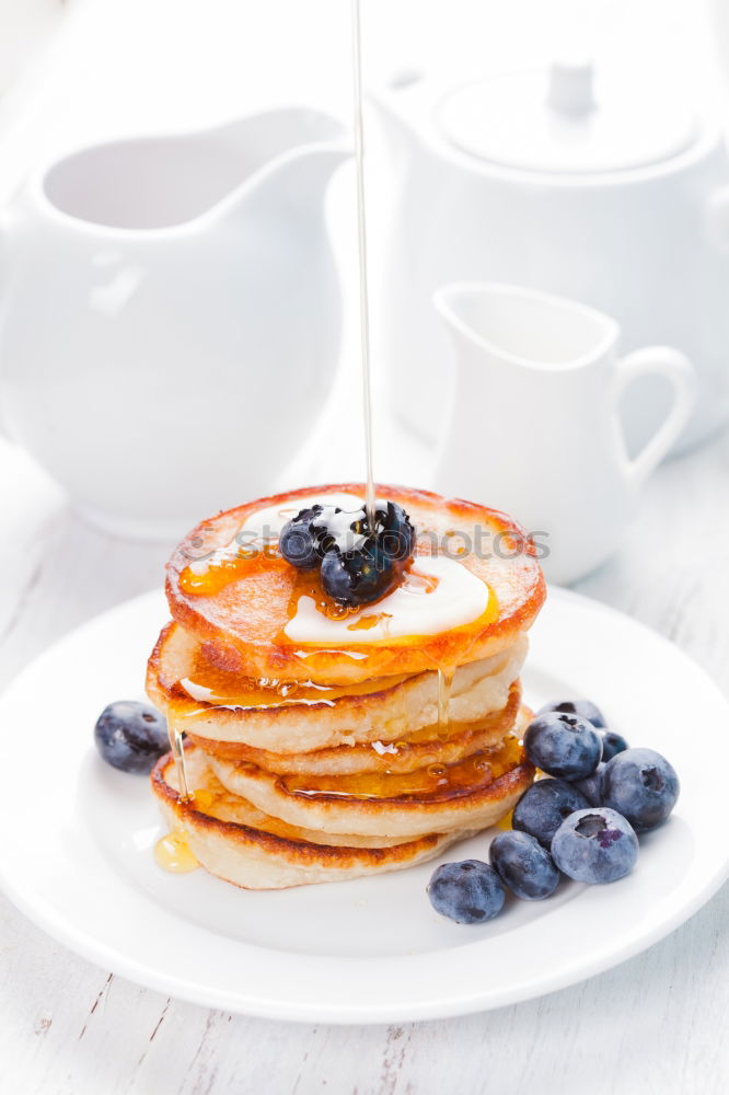 Similar – Image, Stock Photo Pancakes with raspberries and blueberries