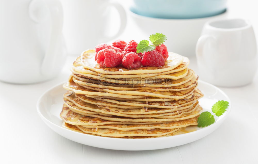 Similar – Image, Stock Photo Pancakes with raspberries and blueberries on white