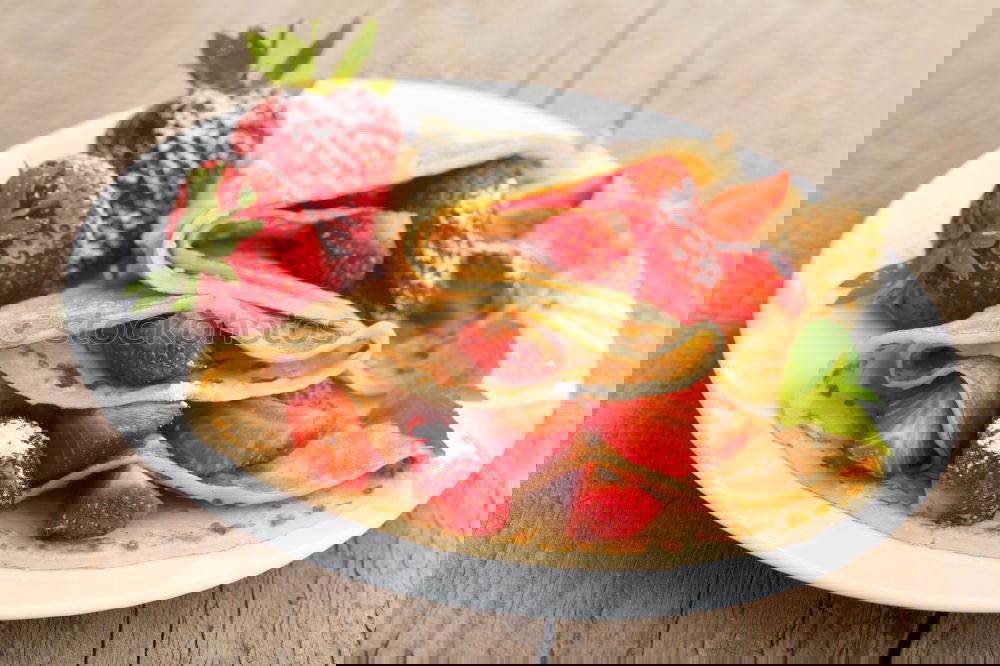 Similar – Image, Stock Photo Crepes with chocolate cream and strawberries