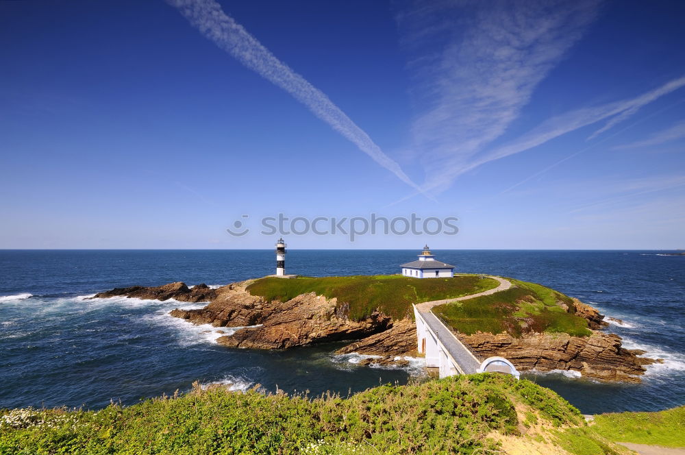 Image, Stock Photo Lighthouse on island in Cornwall with rocks