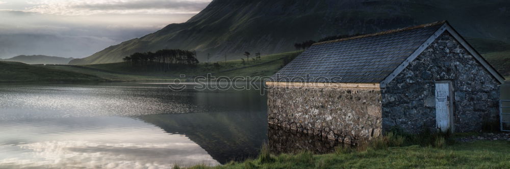 Similar – A moody village at dusk on Lofoten Island