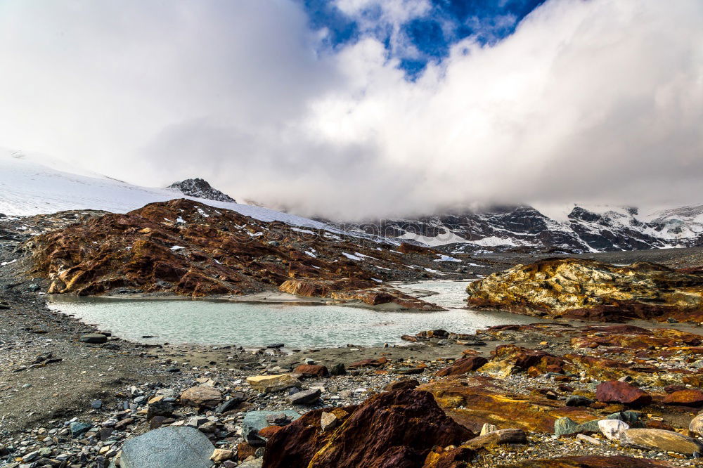 Similar – Mountain lake with fog