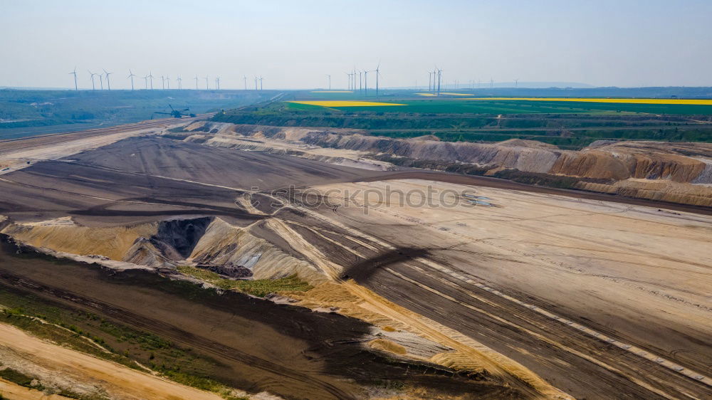 Similar – Opencast mining with conveyor crane