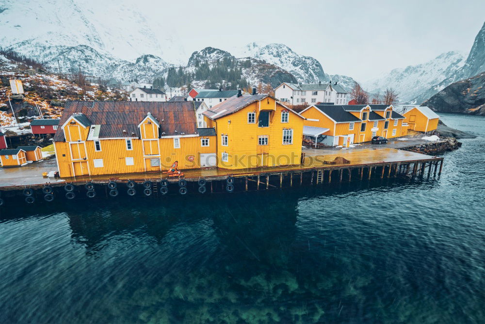 Similar – Small houses on lakeside in mountains