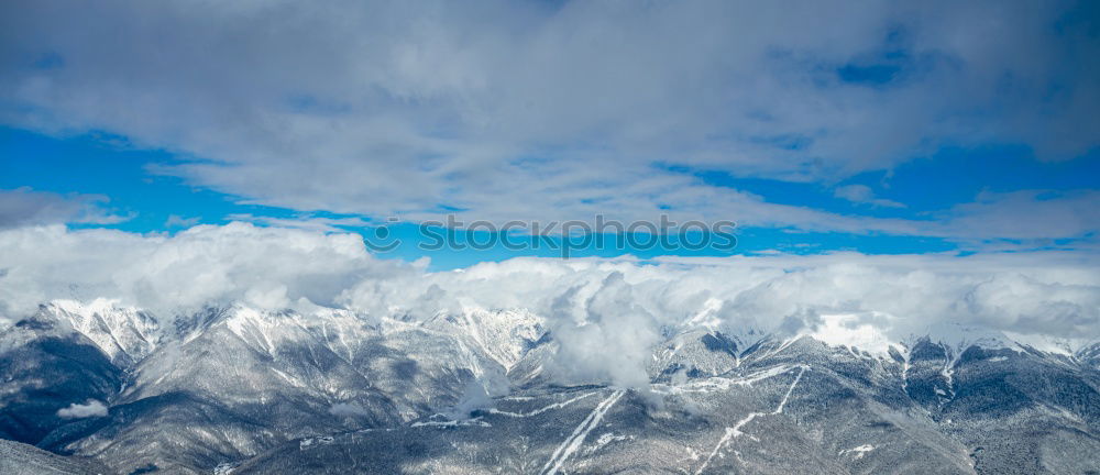 Similar – Picturesque view of snowy mountains