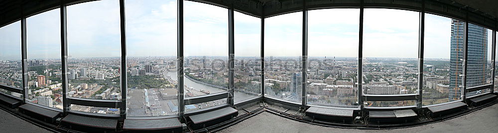 Similar – View out of the window of a high-rise building on the area around Frankfurt’s railway station