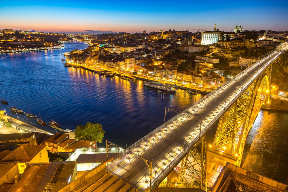 Aerial cityscape of Porto and Vila Nova da Gaia with connecting bridge, Portugal