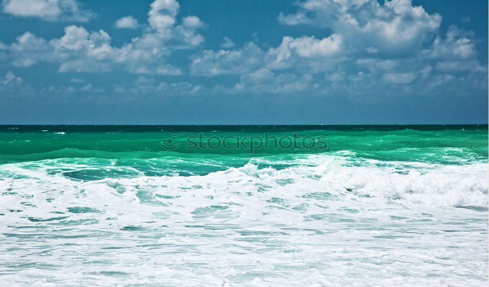 Similar – Image, Stock Photo Sand, sea and blue sky and dark clouds. At the beach of Fraser Island at the east coast of Queensland / Australia