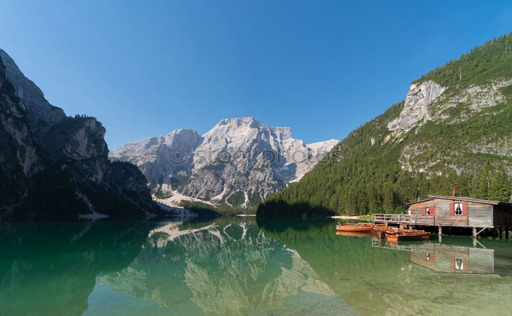 Similar – Wooden dock on lake in mountains