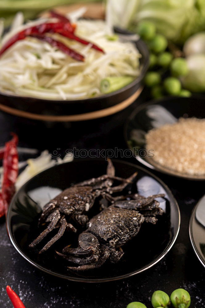 Similar – Foto Bild Eine Person sitzt mit Essstäbchen in der Hand vor einer leckeren Pho Suppe in Vietnam