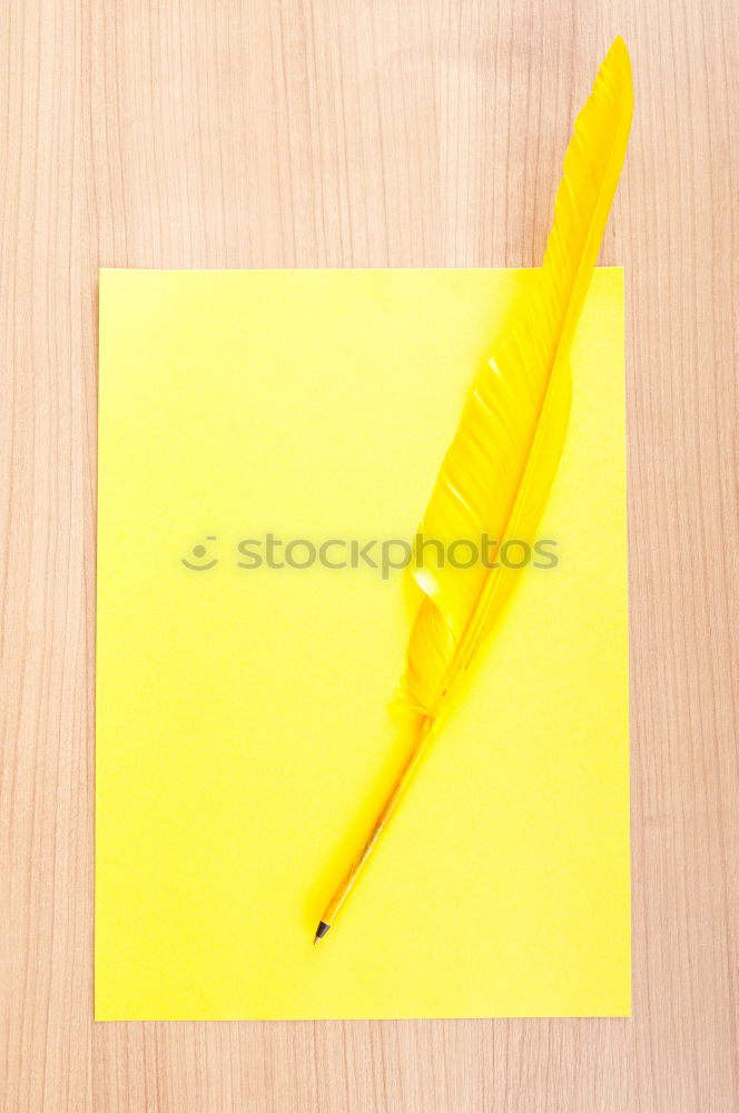 Similar – Image, Stock Photo Forearm and hand with pencil against a yellow background