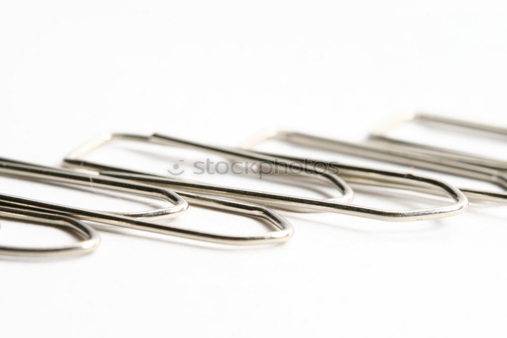 Similar – Image, Stock Photo several paperclips magnetically adhere to a container