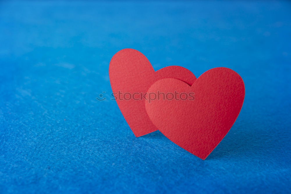 Similar – jeans and two red wooden hearts