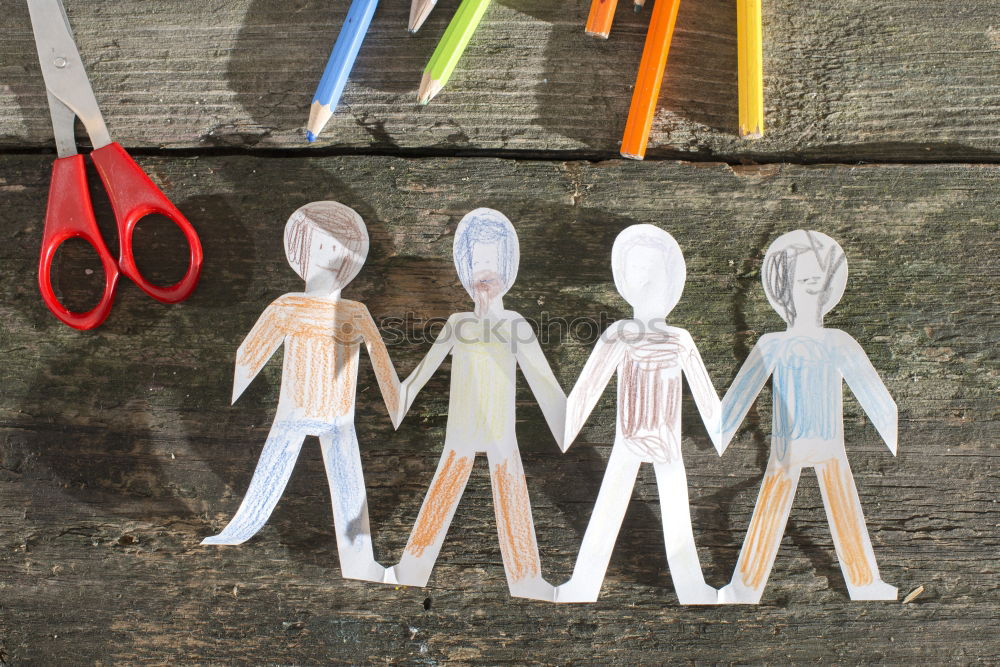 Similar – Paper made people figures