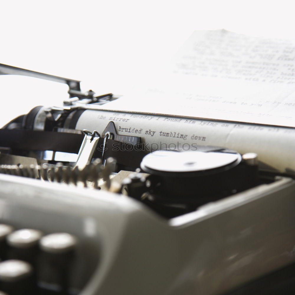 Similar – Text prescribed on a vintage typewriter and watch timekeeper.