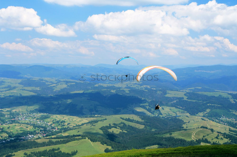 Similar – Schräger Vogel Gleitschirm Aufziehübungen