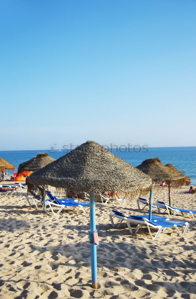 Similar – Empty deckchairs on the beach