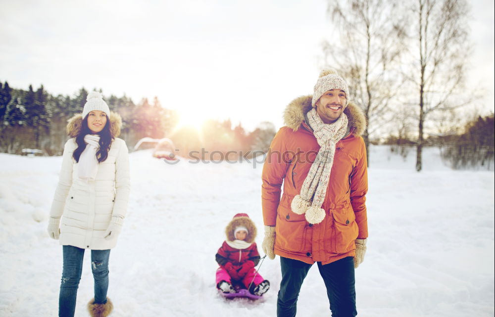 Similar – Image, Stock Photo Family spending time together outdoors in the winter. Parents with children gathered around the campfire preparing marshmallows and snacks to toasting over the campfire using wooden sticks