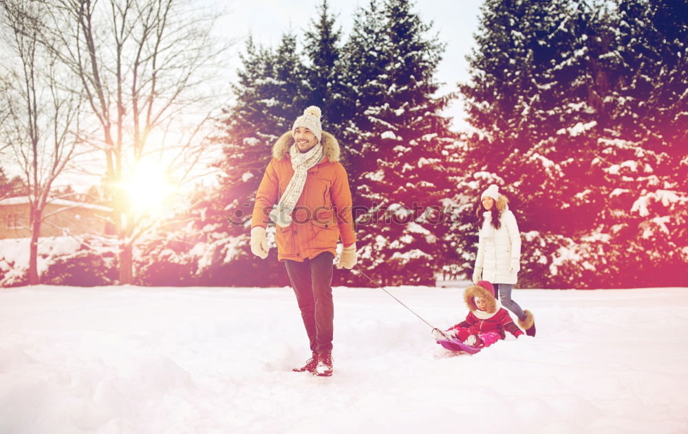 Similar – Friends playing snowballs in woods