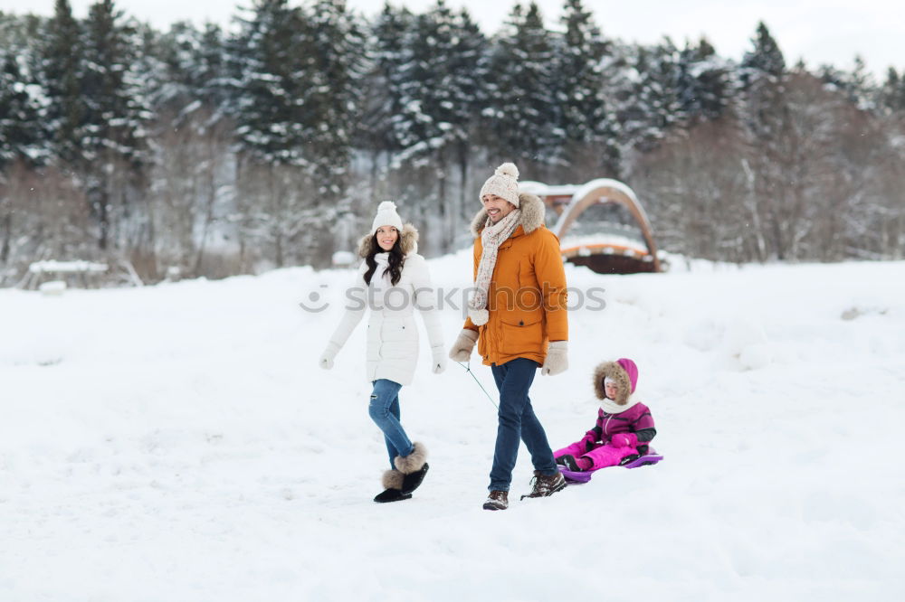 Image, Stock Photo Family spending time together outdoors in the winter. Parents with children gathered around the campfire preparing marshmallows and snacks to toasting over the campfire using wooden sticks