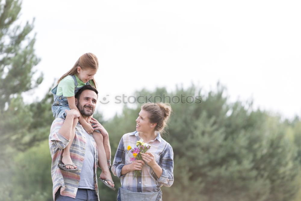 Image, Stock Photo Father holds up his little son