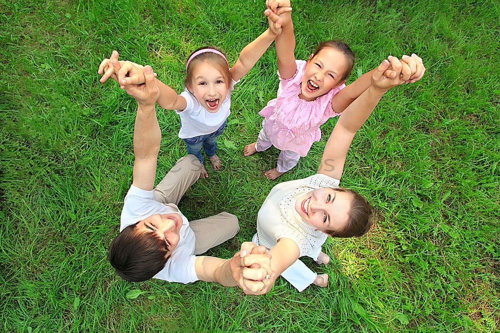 Similar – Three happy children playing in the park at the day time.