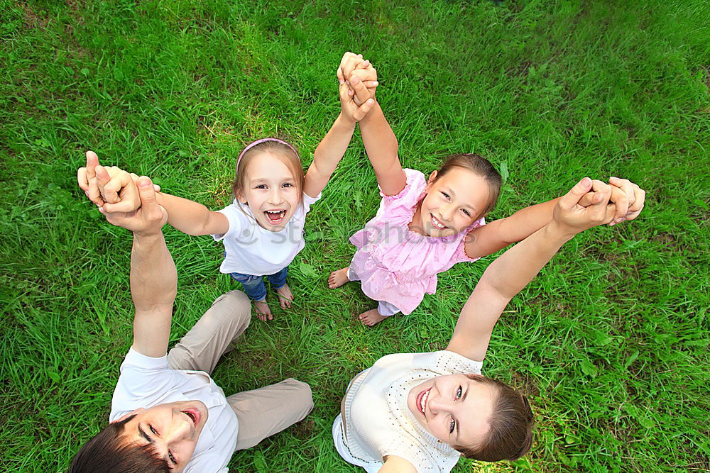 Similar – Three happy children playing in the park at the day time.