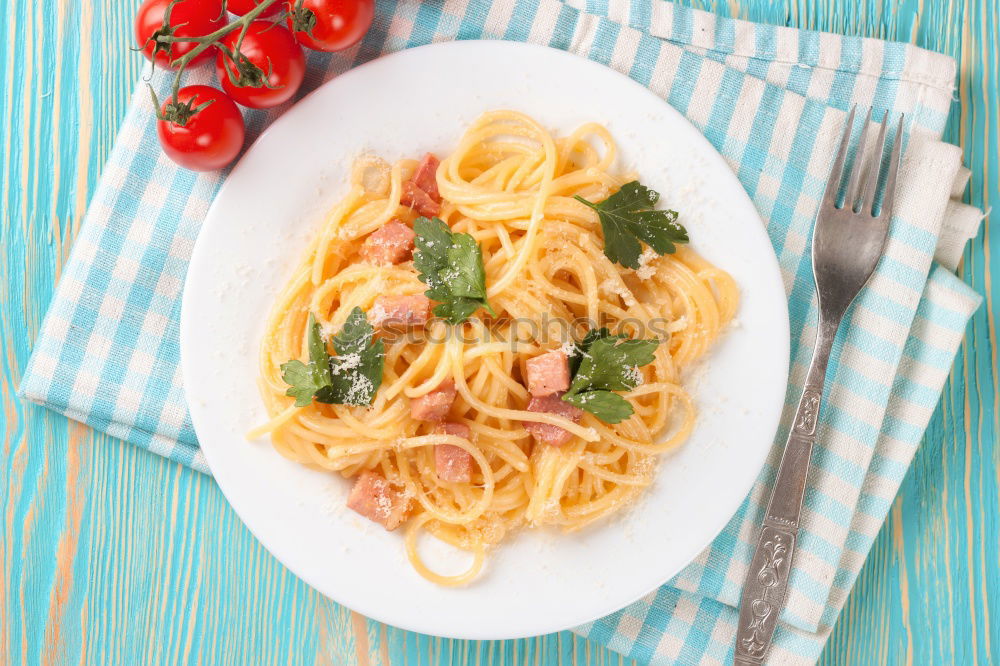 Similar – Spaghetti Carbonara in a green plate