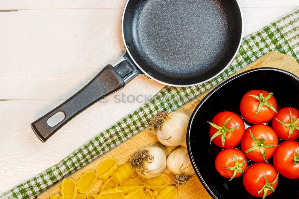 Similar – empty round black frying pan, top view