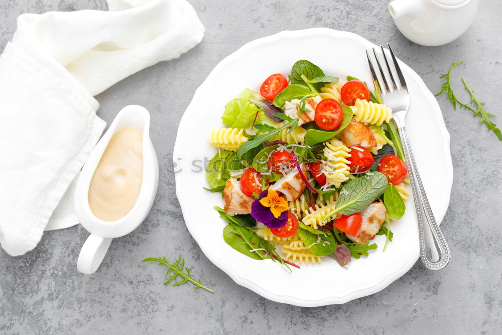 Similar – Mixed salad with baby leaves, radish, cucumber and feta cheese