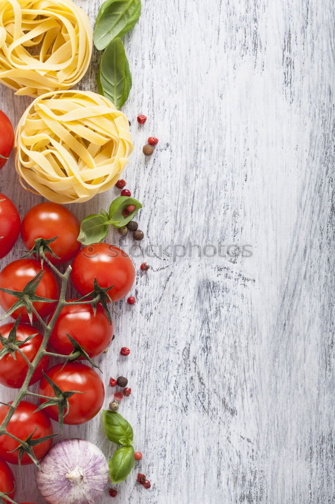 Similar – Image, Stock Photo Tagliatelle with tomatoes and spices for tomato sauce