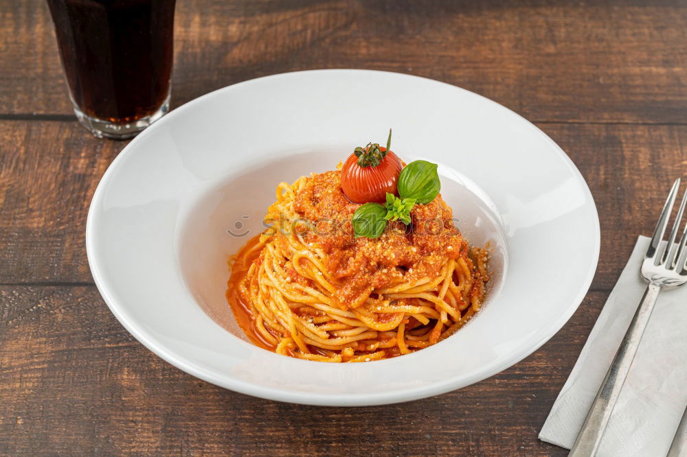 Similar – Plate of penne pasta with arrabiata sauce