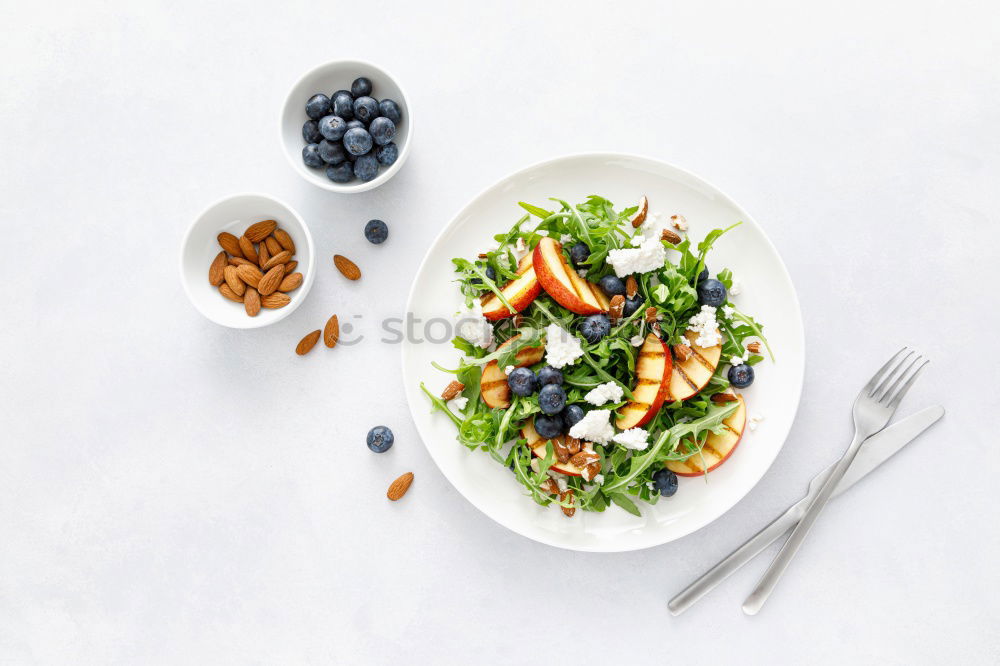 Similar – Mixed salad with baby leaves, radish, cucumber and feta cheese