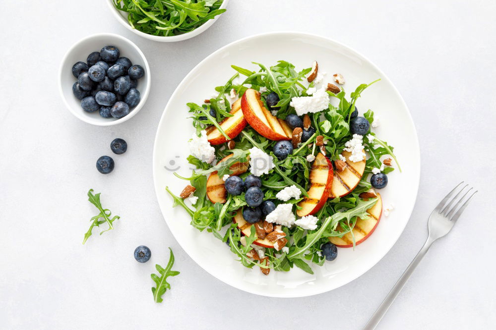 Similar – Mixed salad with baby leaves, radish, cucumber and feta cheese