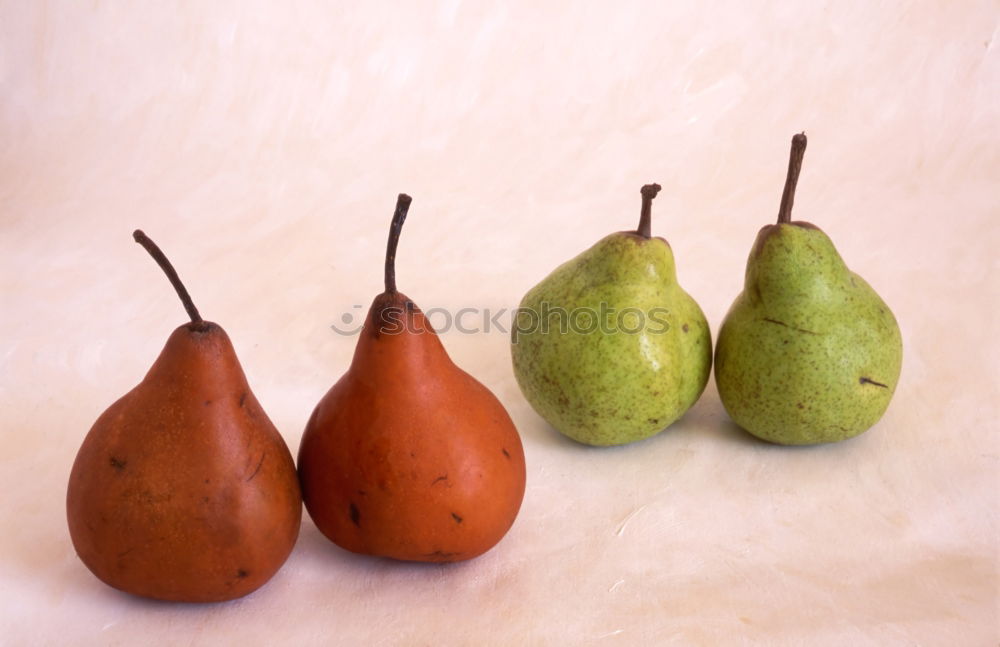 Similar – Image, Stock Photo Eight pears and three tomatoes, regularly arranged on a wooden table