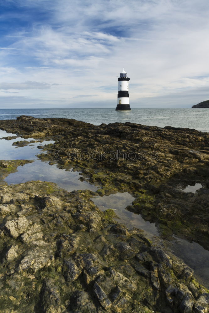 Similar – One lighthouse red-white