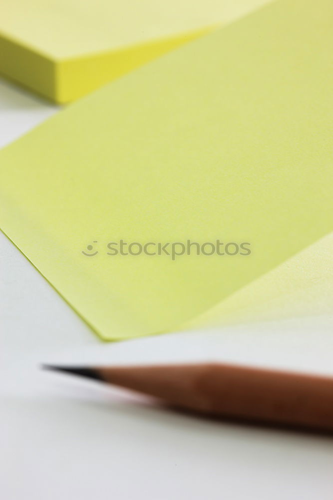 Similar – Green slip of paper with pen, a cup of coffee and a potted plant