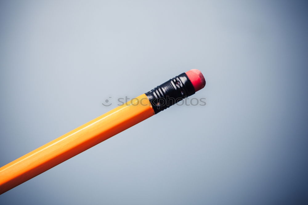 Similar – Red pencil and black pencil