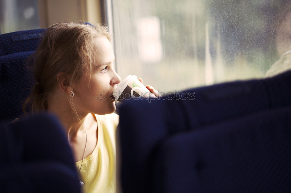 Image, Stock Photo Toddler looks curiously out of the train window