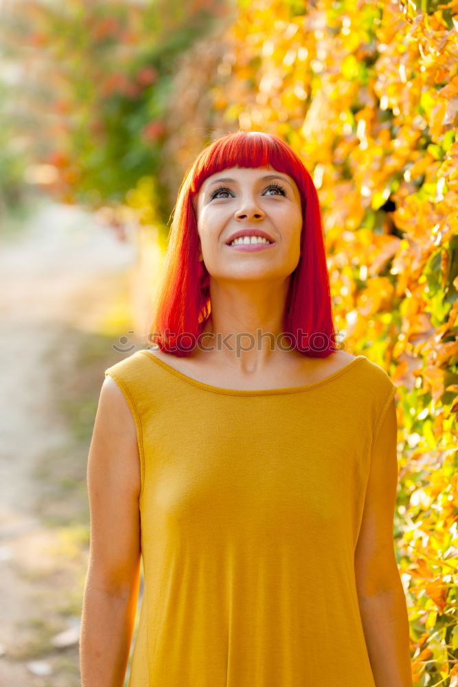 Image, Stock Photo Beautiful red haired woman in a park