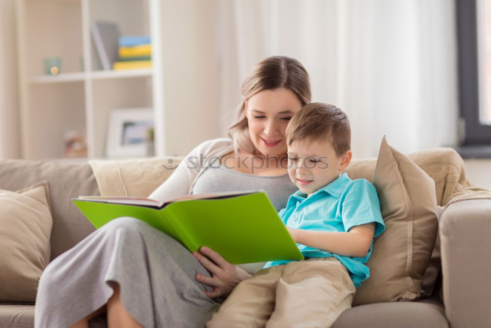 Similar – happy mother and toddler son using tablet