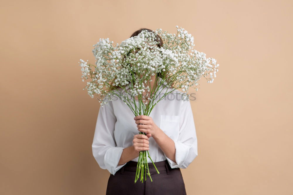 Similar – Image, Stock Photo Portrait of woman holding bouquet of flowers