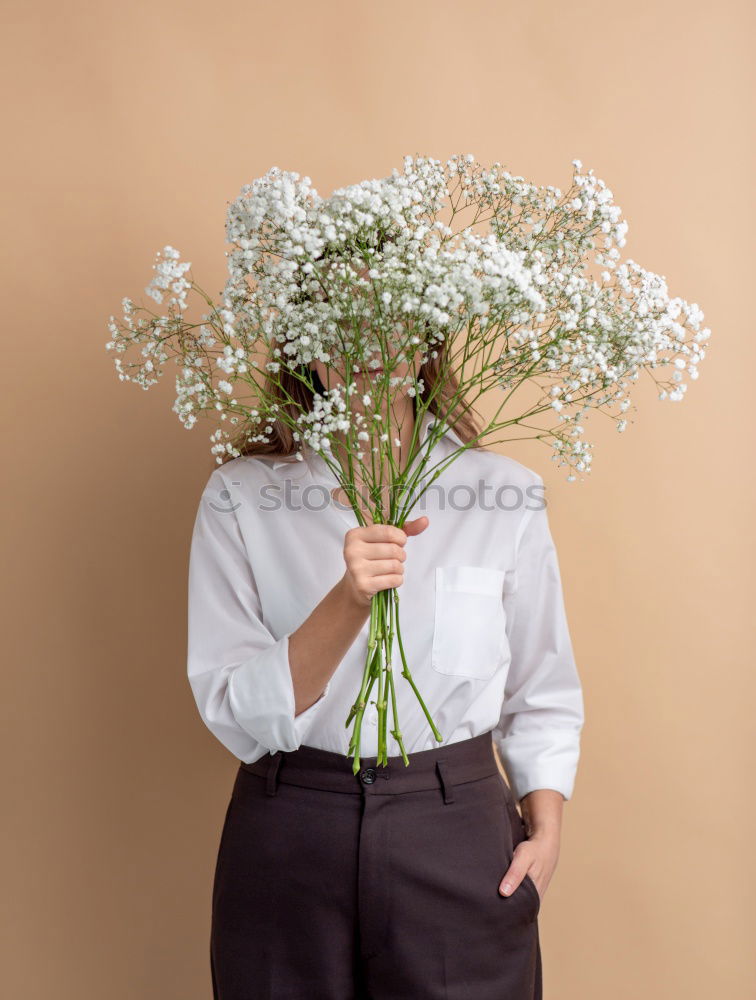 Similar – Image, Stock Photo Young man with bunch of flowers in hands